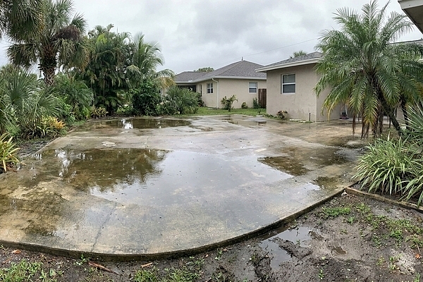 Is Your Concrete Patio in Orlando Holding Water After Rainstorms?