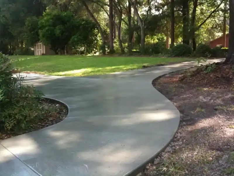 Worn concrete surface in Orlando showing exposed aggregate and signs of severe weathering